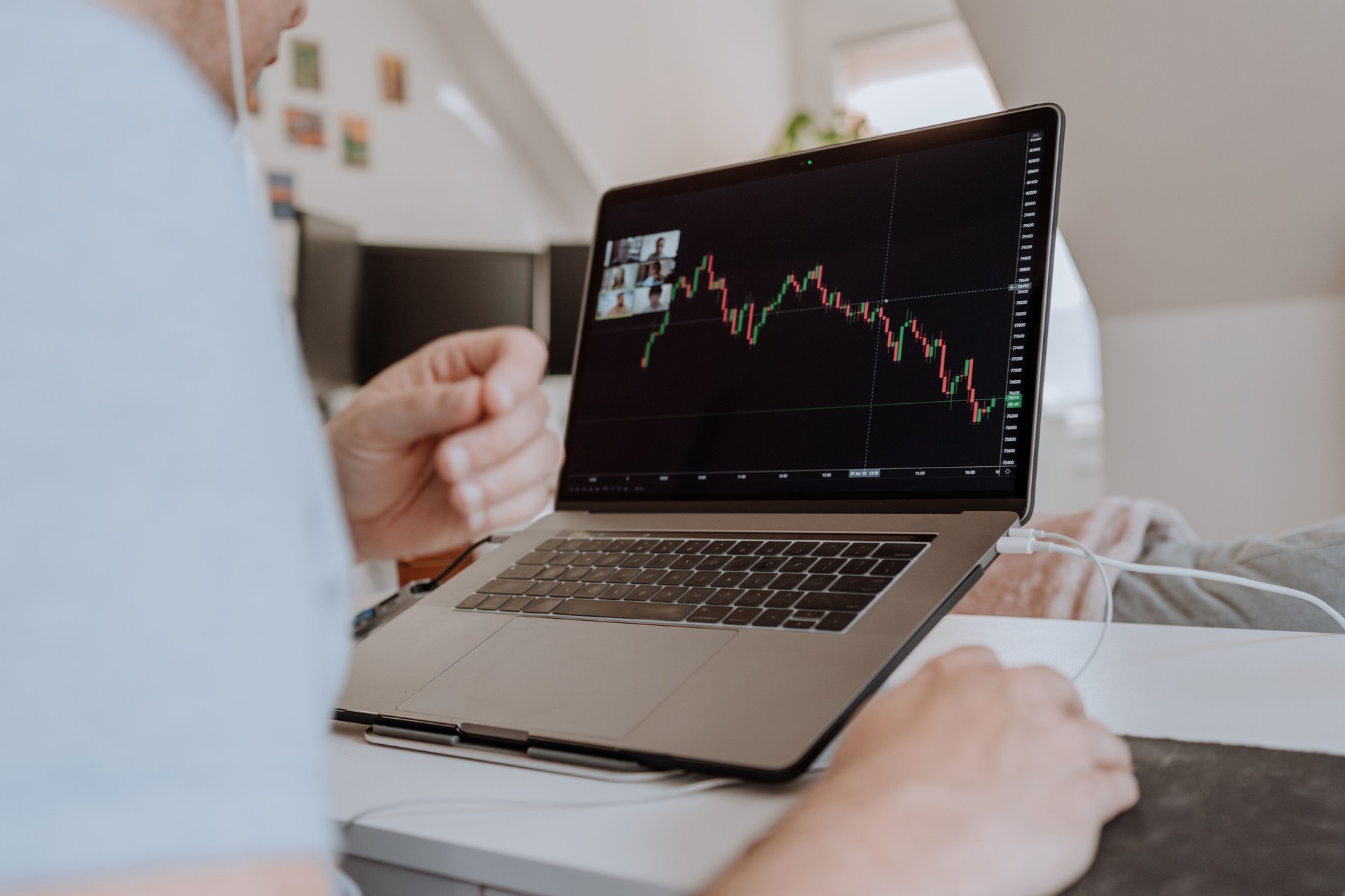 Stock market teacher doing a teleconference with students